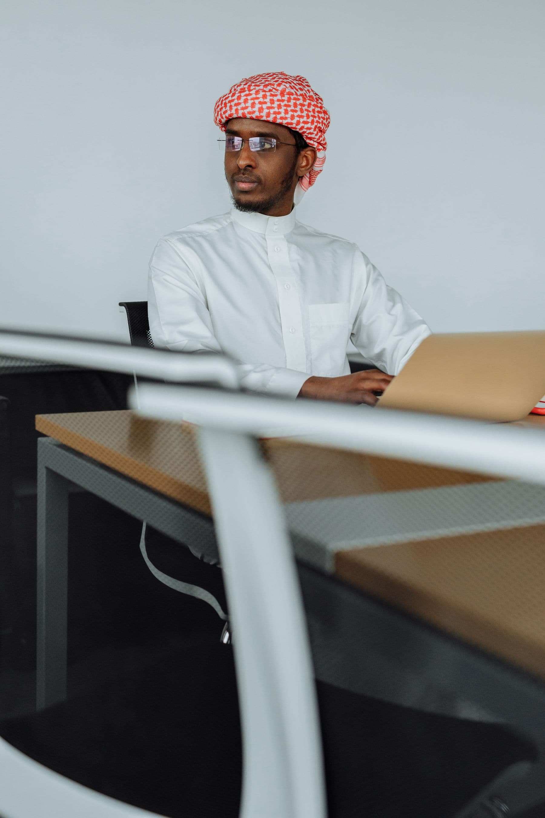 Business owner working at a laptop