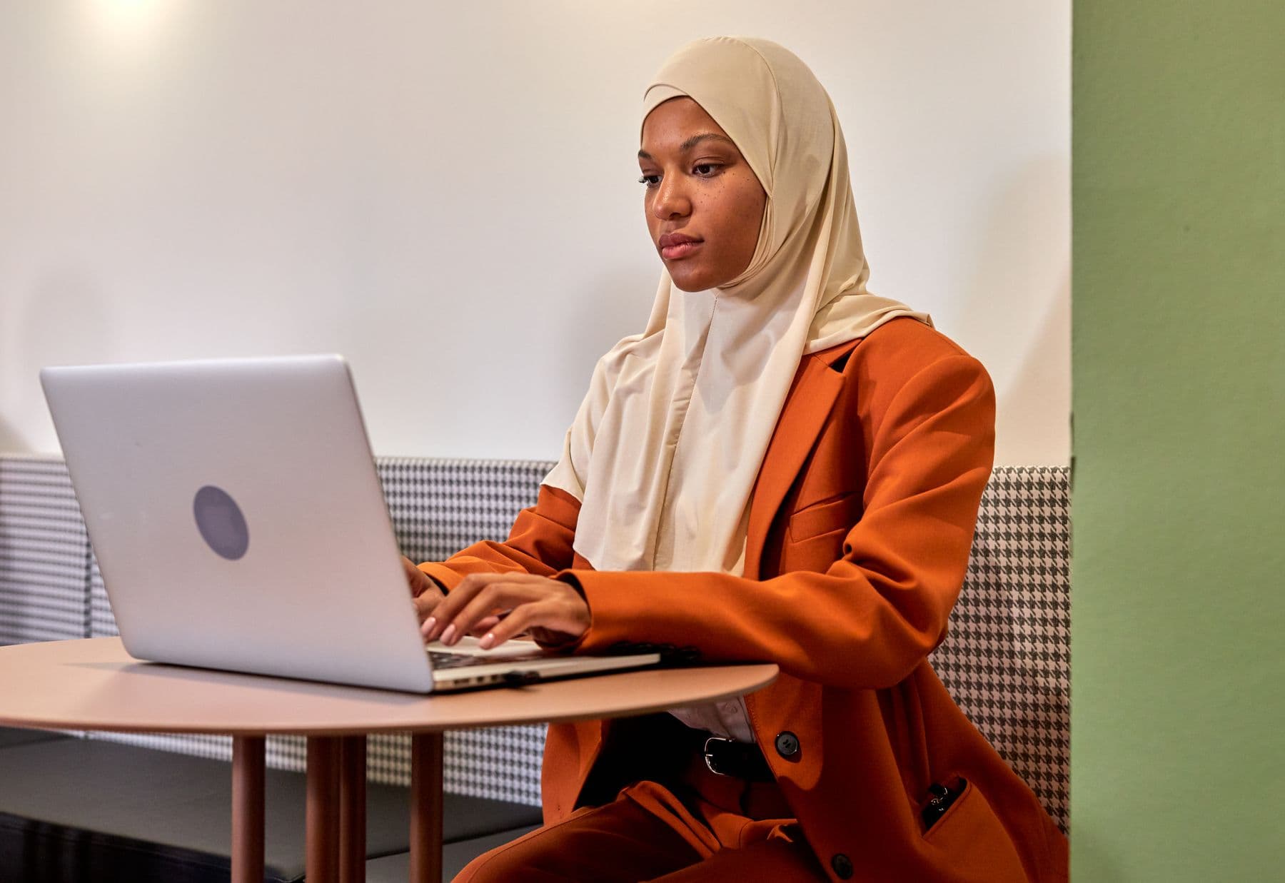 Business owner working at a laptop