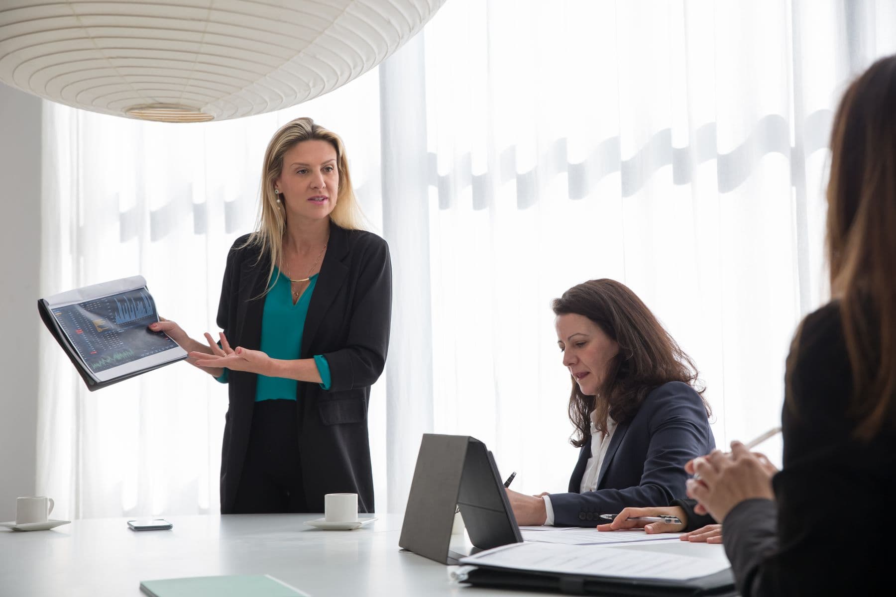 A licensed accountant reviewing figures with a business owner